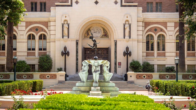 View of water fountain and front of USC Doheny Memorial Library