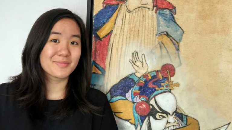 Cropped headshot of Kimberly Cheng in front of a Chinese painting.