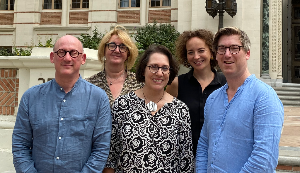 The Third Interdisciplinary Research Week Team pose in front of Doheny Library. From left to right: Jean-Marc Dreyfus, Elisabeth Anstett, Michaela Haibl, Anne-Berenike Rothstein, and Seán Williams.