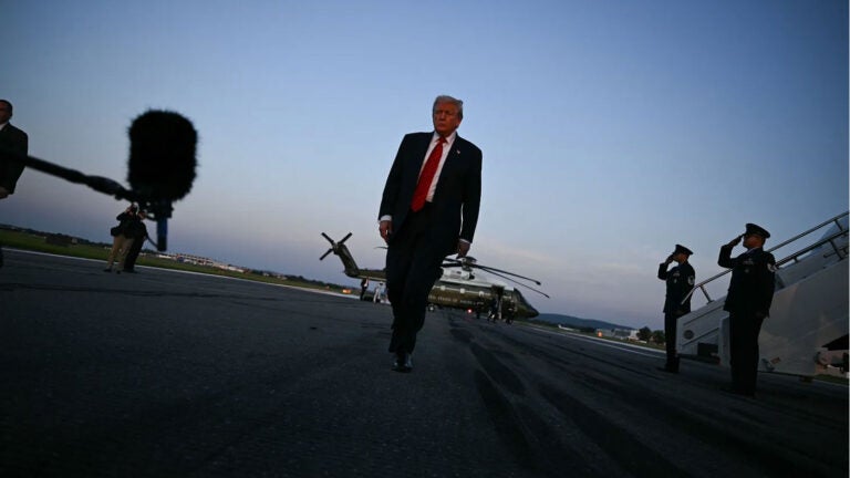 President Donald Trump walks to speak to the media at Lehigh Valley International Airport in Allentown, Pennsylvania, on August 3, 2025. (Photo by BRENDAN SMIALOWSKI/AFP via Getty Images)