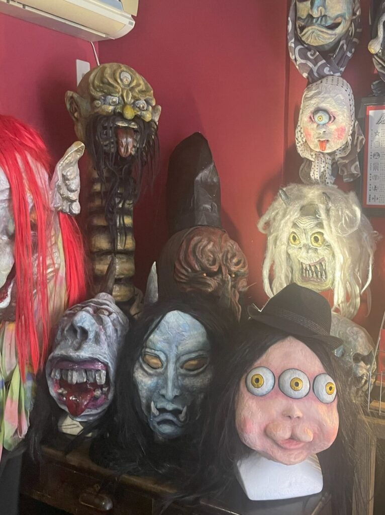 Various sculptures of monster heads