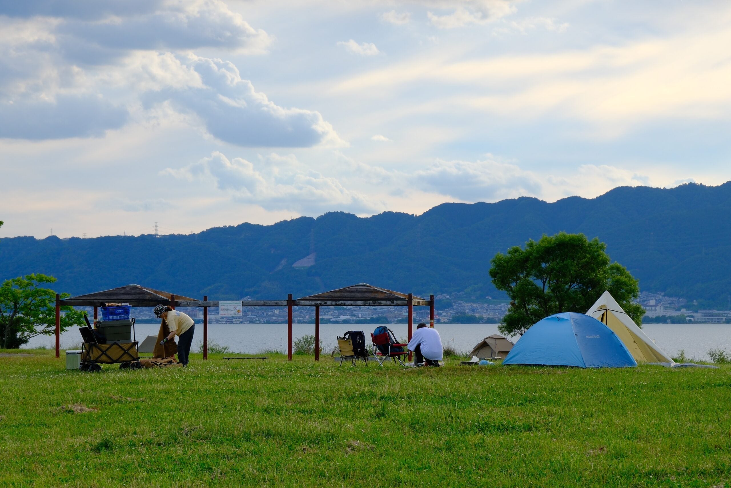 Tents set up by the lakeside