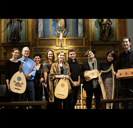 Collegium Musicum members standing with their musical instruments
