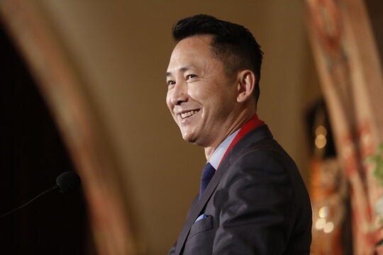 A side profile of Professor Viet Nguyen at Town & Gown where he received the presidential medallion.