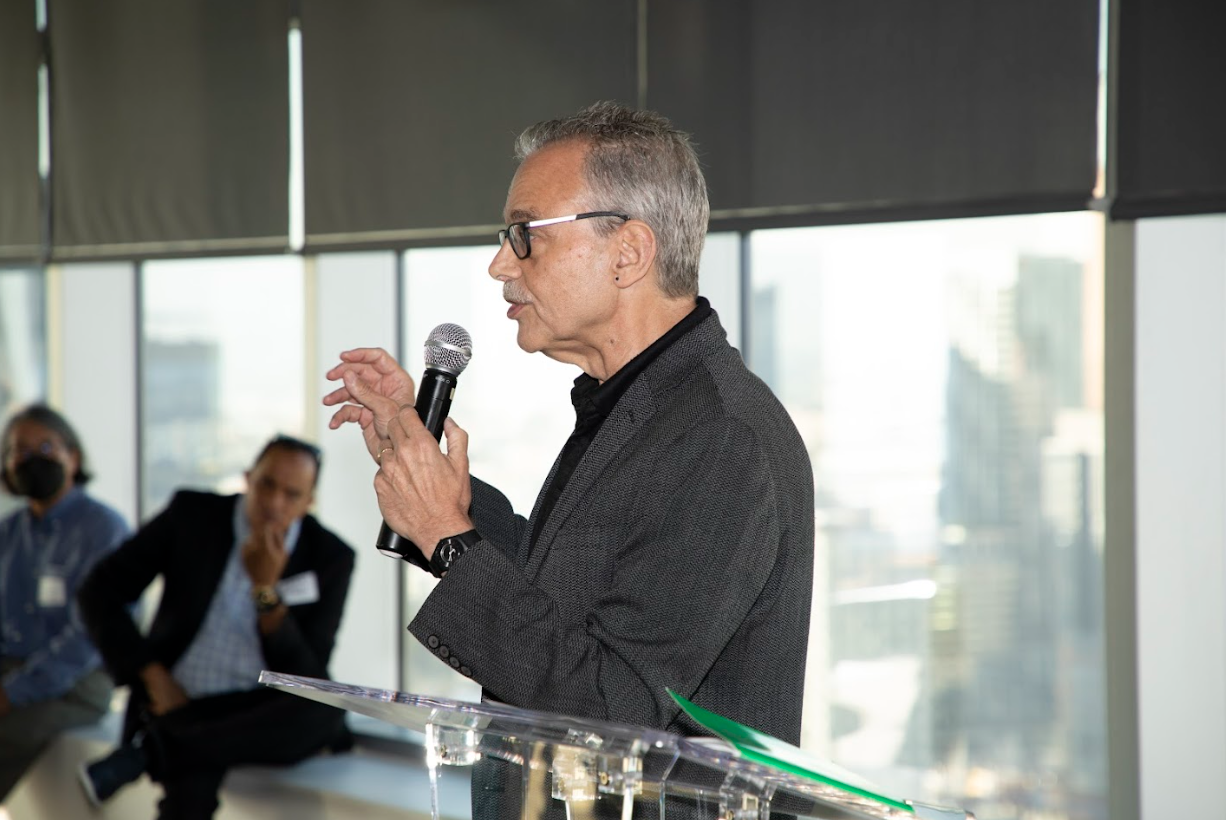 Side view of Manuel Pastor speaking at the ERI Anniversary Party