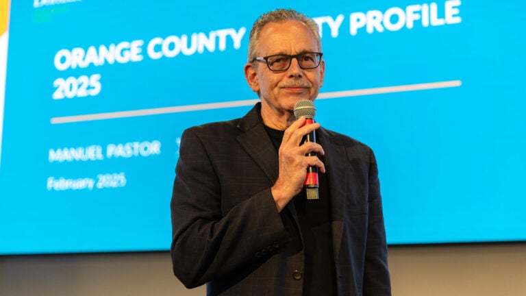 Close up of Dr. Manuel Pastor presenting the Orange County Equity Profile 2025 report at event