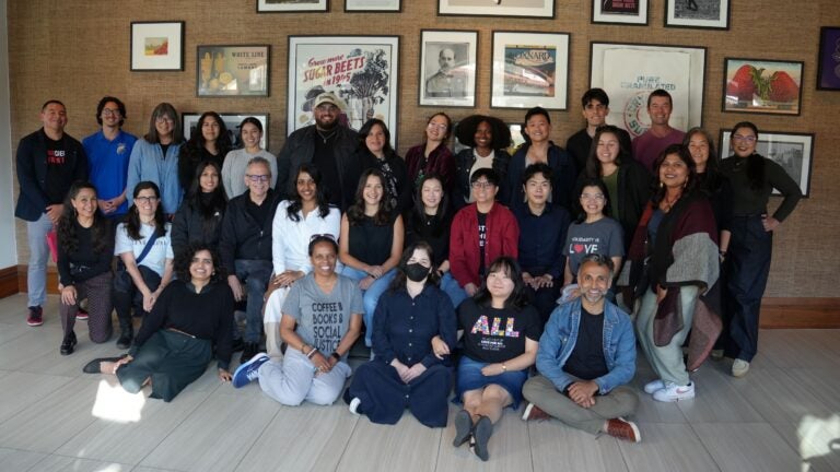 Group photo of about 25 ERI staff, affiliated faculty, and guests at an ERI retreat