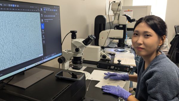 woman at microscope