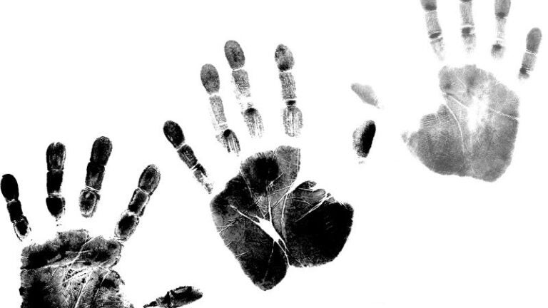 Photo of three handprints