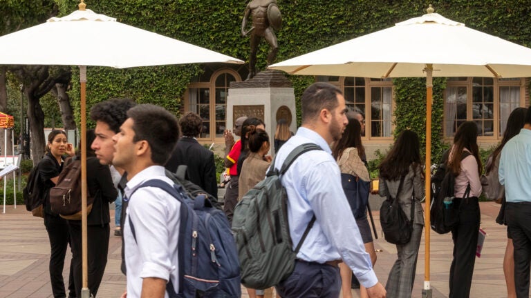 Image of students walking past on Trousdale