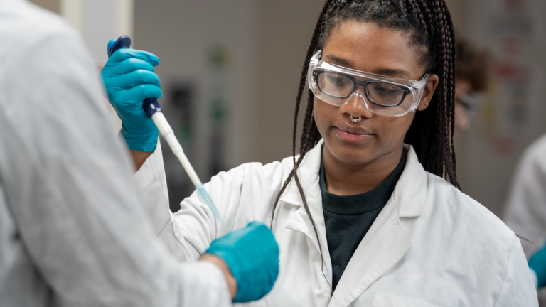Image of student researcher with pipette