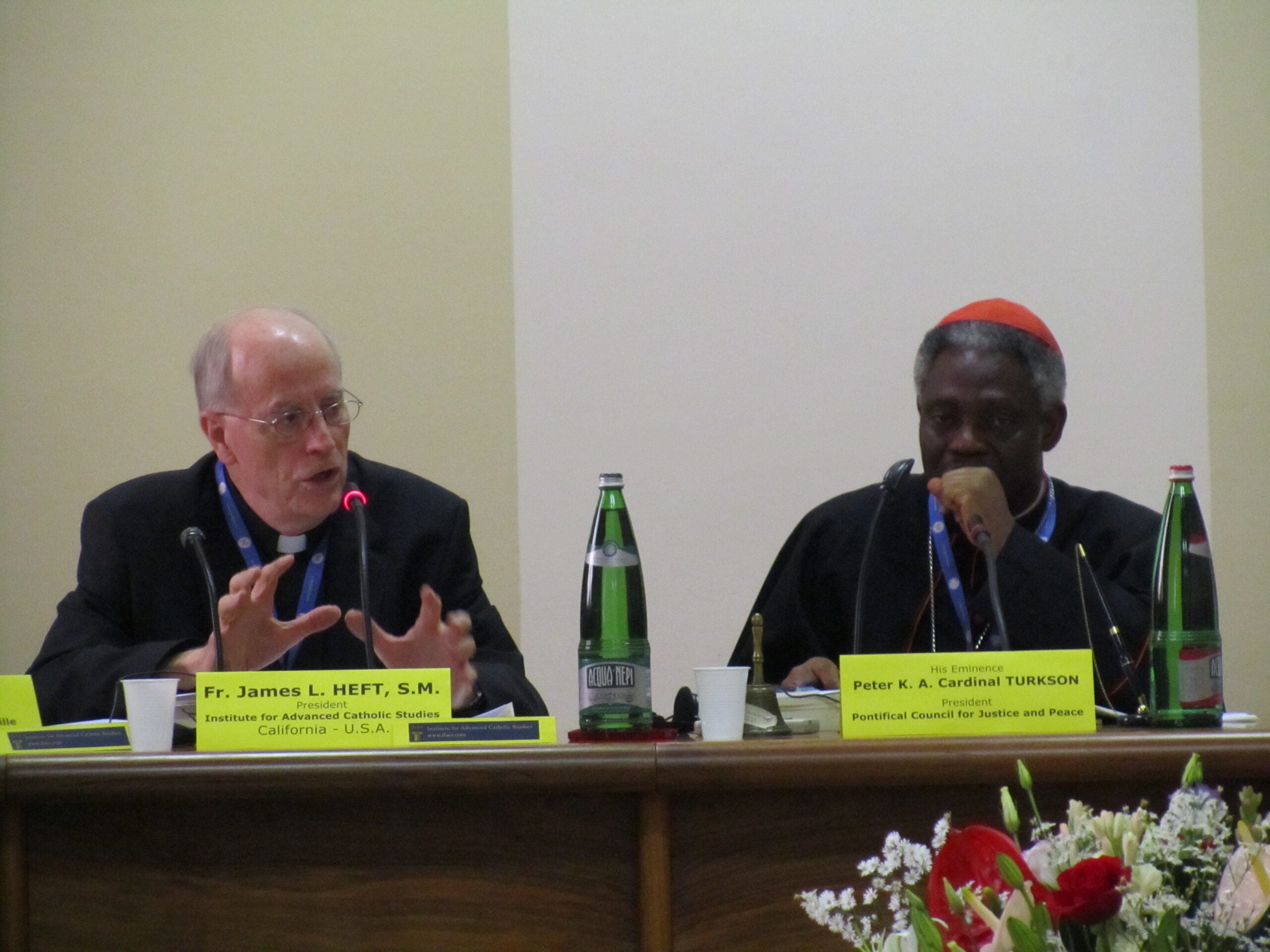 A photo of Fr. Heft was in Rome at a Vatican confrenece with Cardinal Turkson.