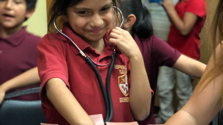 Young student with a stethoscope