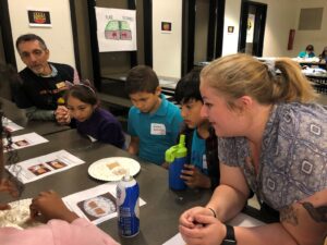 JEP Staff and kids doing a hands-on experiment