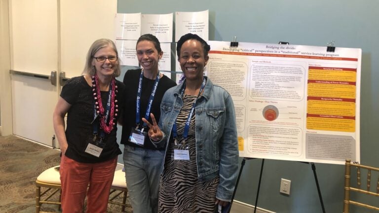 Susan Harris, Samantha Bernstein-Sierra, and Sable Manson presenting a poster