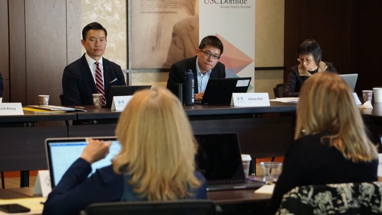 People sitting around a conference table
