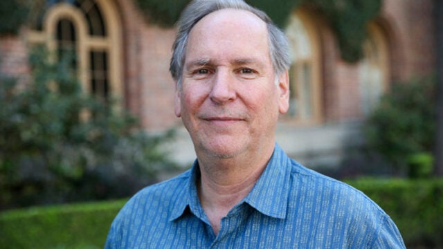 Portrait of Mark Thompson outdoors on campus