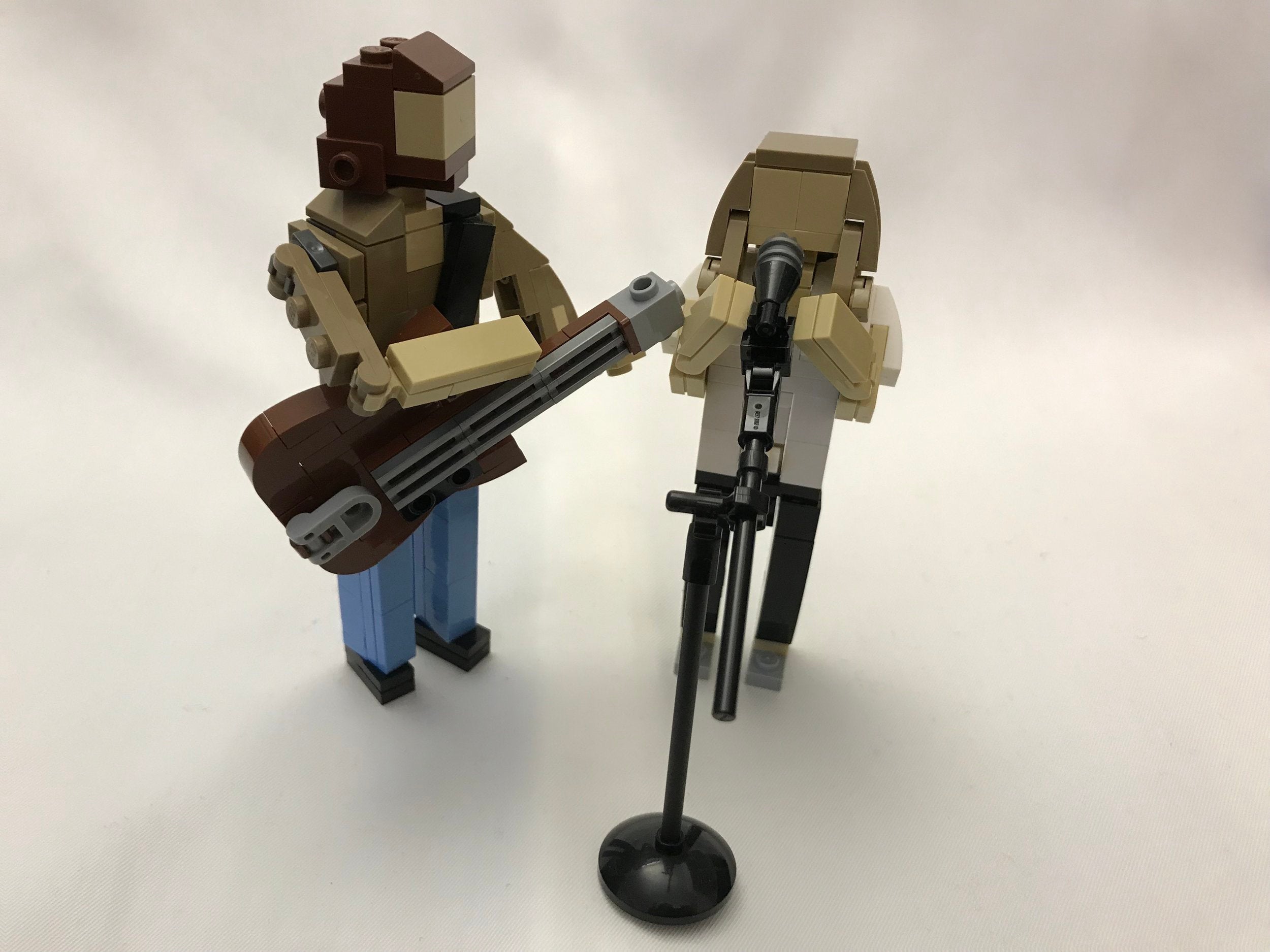Lego scene of Bradley Cooper and Lady Gaga as their characters from the film A Star is Born (2018)