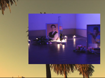 Framed photos of Jerry Seinfeld and Will Smith, with roses, candles, and a half-empty Coca-Cola bottle. Overlayed against image of palm trees.
