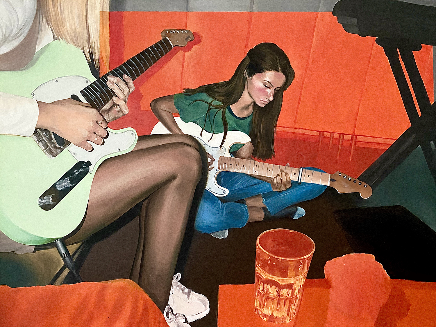 Illustration of two young women playing guitars while sitting.