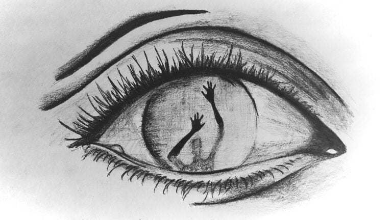 Drawing of an eye. A person with their hands up is seen in the reflection.