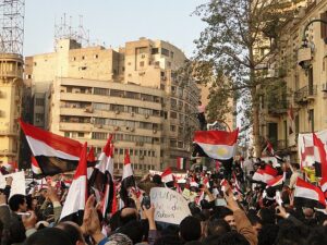 Protesters waving Egyptian flags