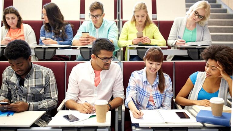 college students studying in lecture hall