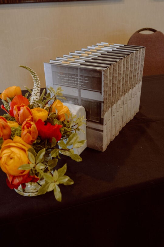 Keynote speaker books with florals.