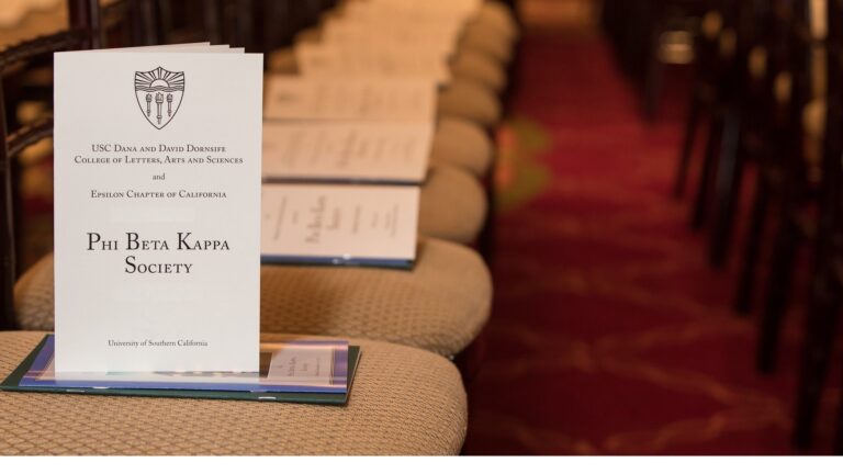 PBK Program are displayed on seats at Town & Gown.