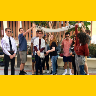 Students participate in a Jewish wedding as part of their Jewish Studies course.