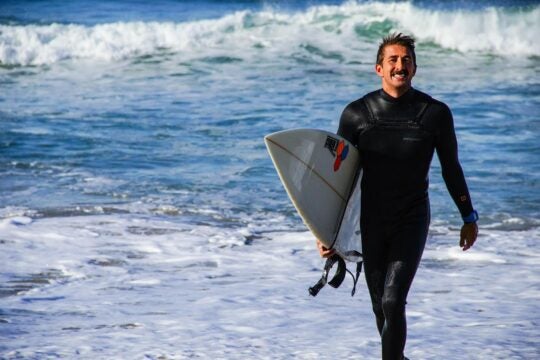 Nick Sadrpour, previous USC Sea Grant employee and surfer, getting tested for antibiotic resistant bacteria