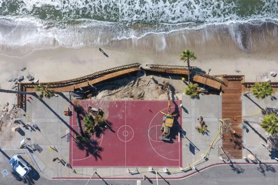 Portions of the renovated basketball court destroyed during a winter storm in 2018.