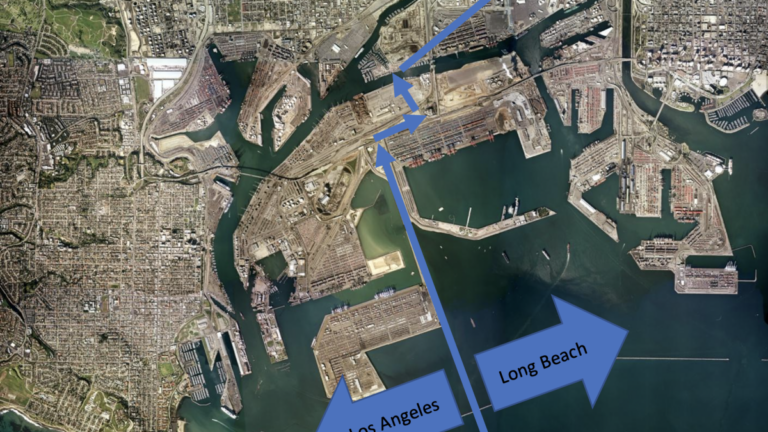 The fine dividing line of the two ports in San Pedro Bay, with the Port of Los Angeles to the left and the Port of Long Beach to the right.