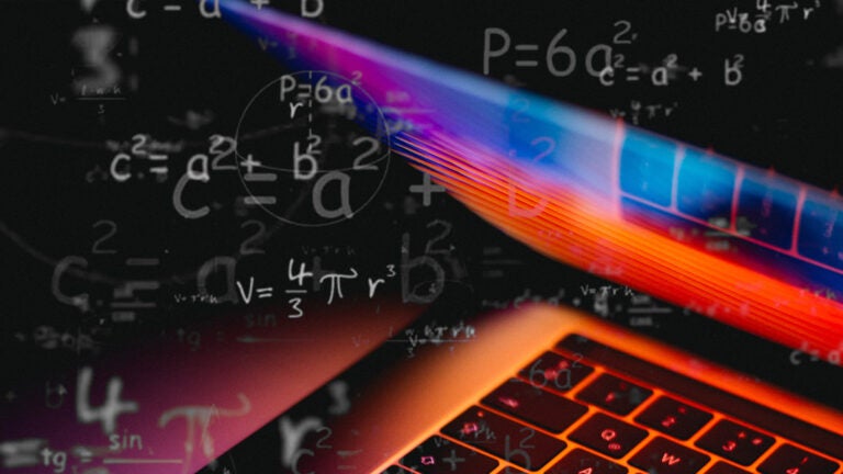 Computer screen glowing with math equations overlaid on top.