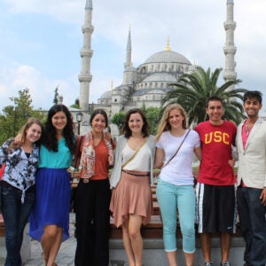 students standing in front of hagia sophia mid day