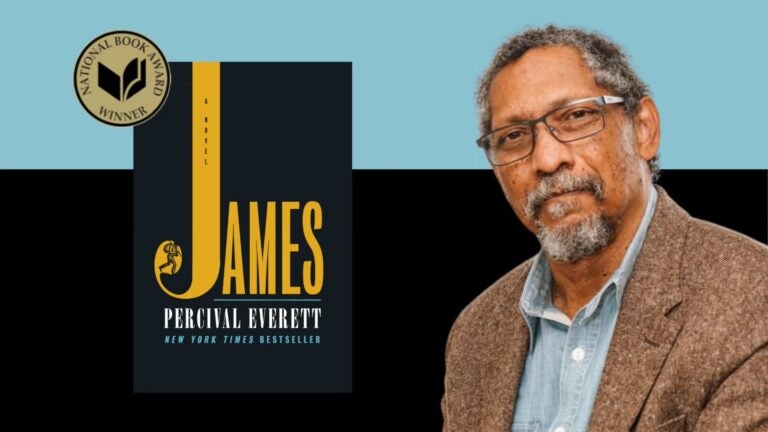 Percival Everett with the cover of his book James