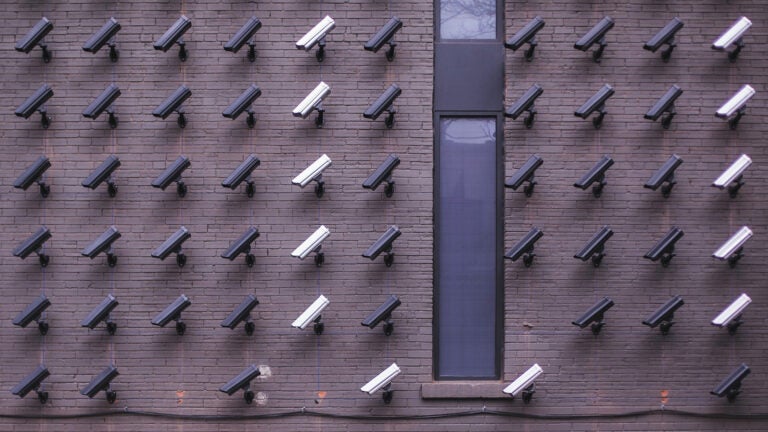 A wall of surveillance cameras.