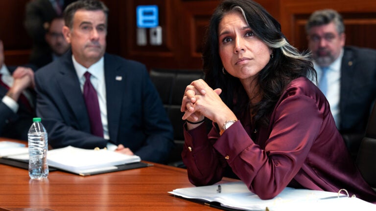 Director of National Intelligence Tulsi Gabbard, right, and CIA Director John Ratcliffe meet in the Situation Room of the White House in June 2025.