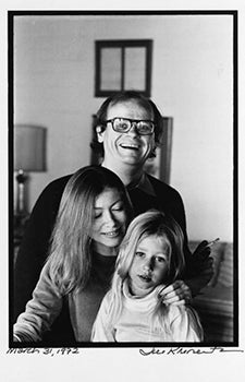 Black-and-white photo of Joan Didion with her husband and daughter