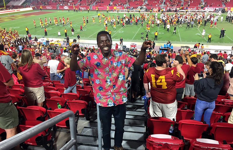 Photo of Robert Nshimiyimana at a USC football game
