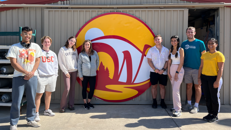 Professor Shannon Gibson stands with students from her class at the Wrigley Marine Science Center